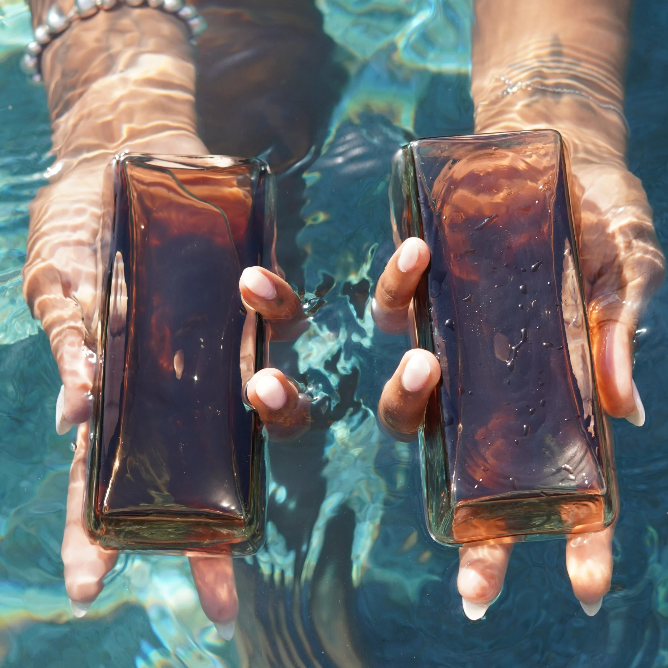 Brick In Hands Pool Submerged_Square